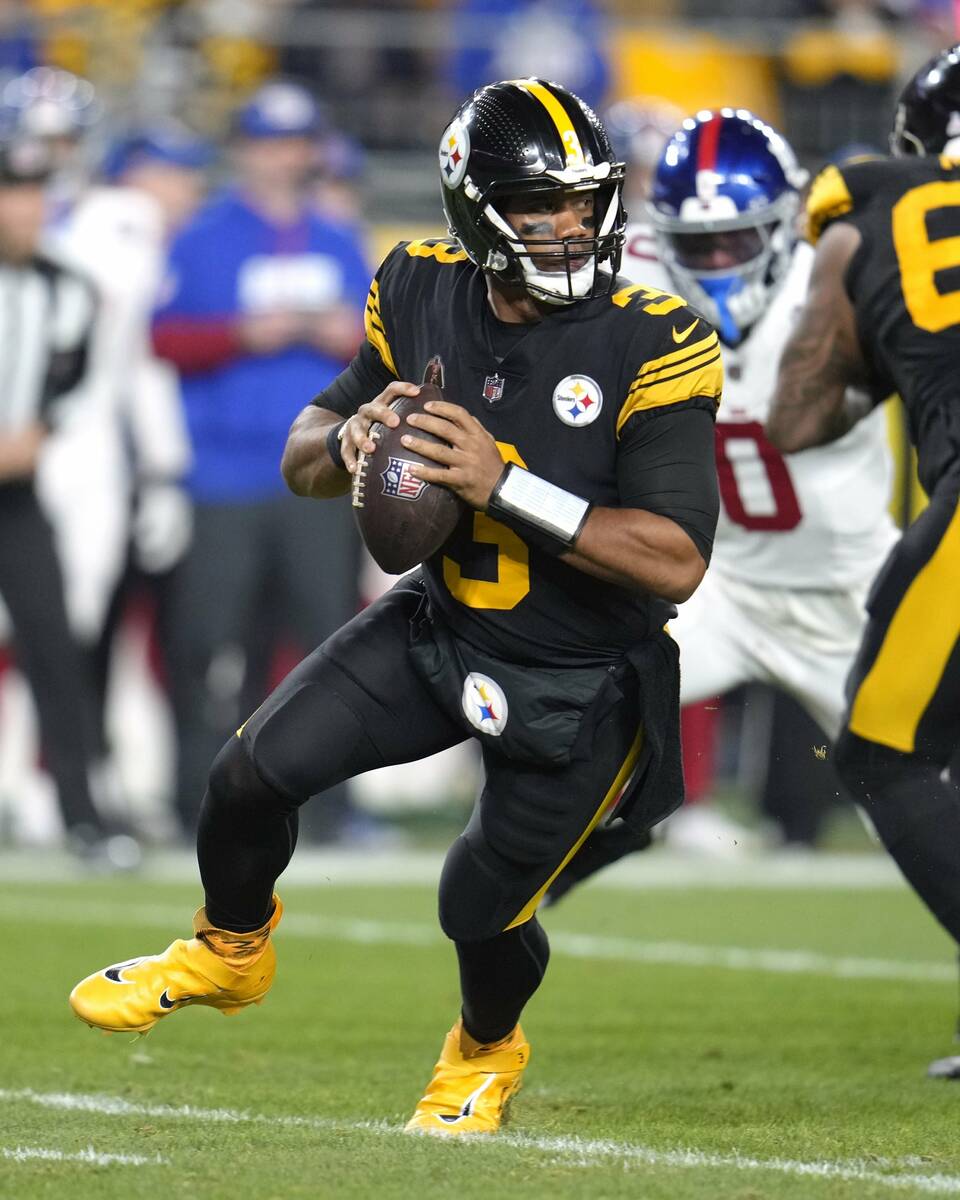 Pittsburgh Steelers quarterback Russell Wilson (3) looks to throw a pass during the first half ...