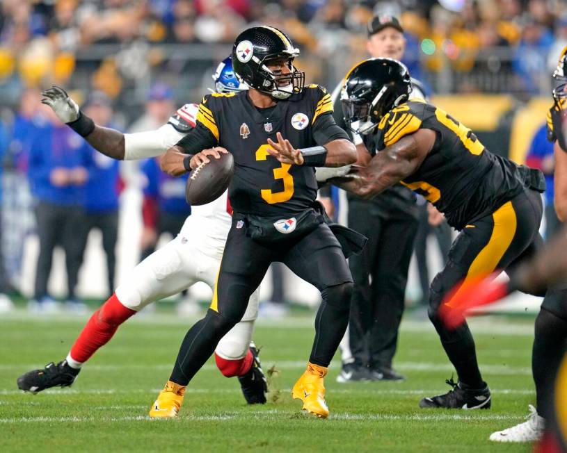 Pittsburgh Steelers quarterback Russell Wilson (3) looks to throw a pass during the first half ...