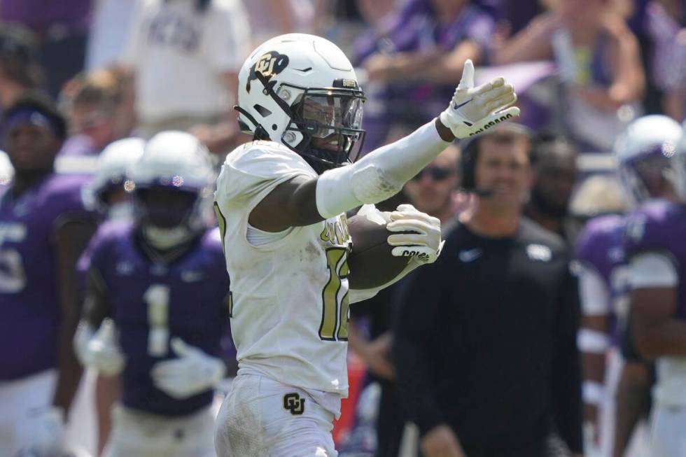 Colorado cornerback Travis Hunter motions after a catch for a first down against TCU during the ...