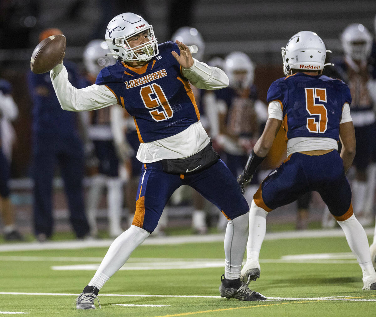 Legacy quarterback Aidan Crawford (9) launches another long throw against Shadow Ridge during t ...