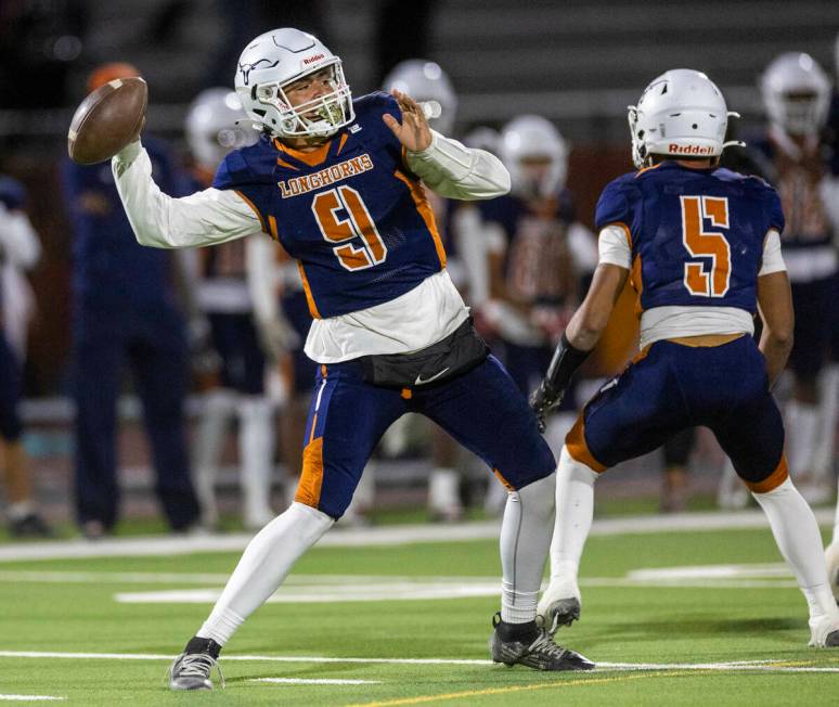 Legacy quarterback Aidan Crawford (9) launches another long throw against Shadow Ridge during t ...