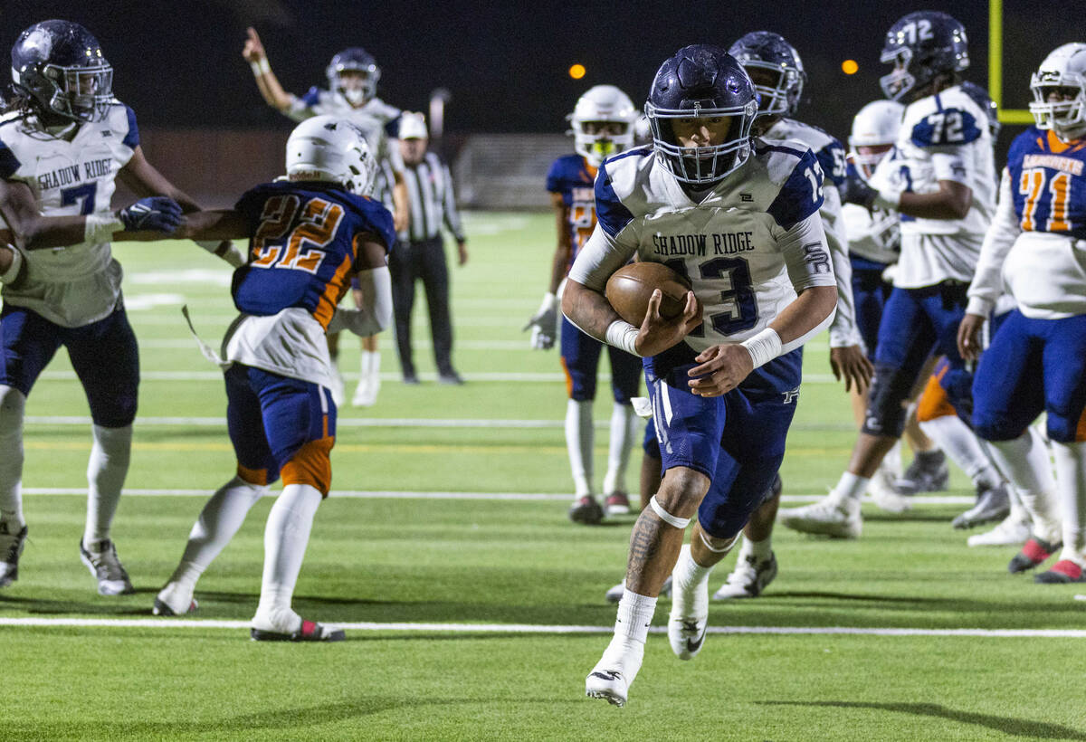 Shadow Ridge fullback Malahkai Berry (13) scores up the middle against Legacy during the first ...