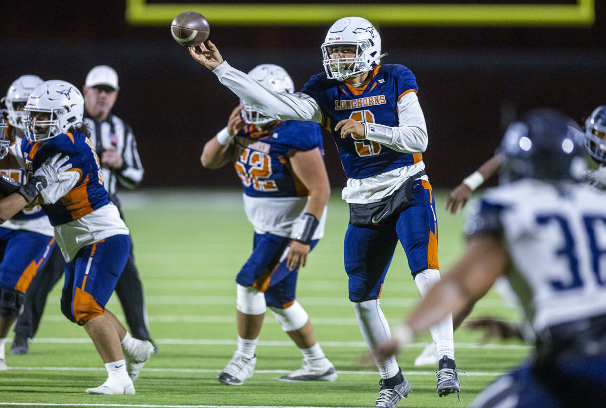 Legacy quarterback Aidan Crawford (9) slings a pass to a receiver against Shadow Ridge during t ...