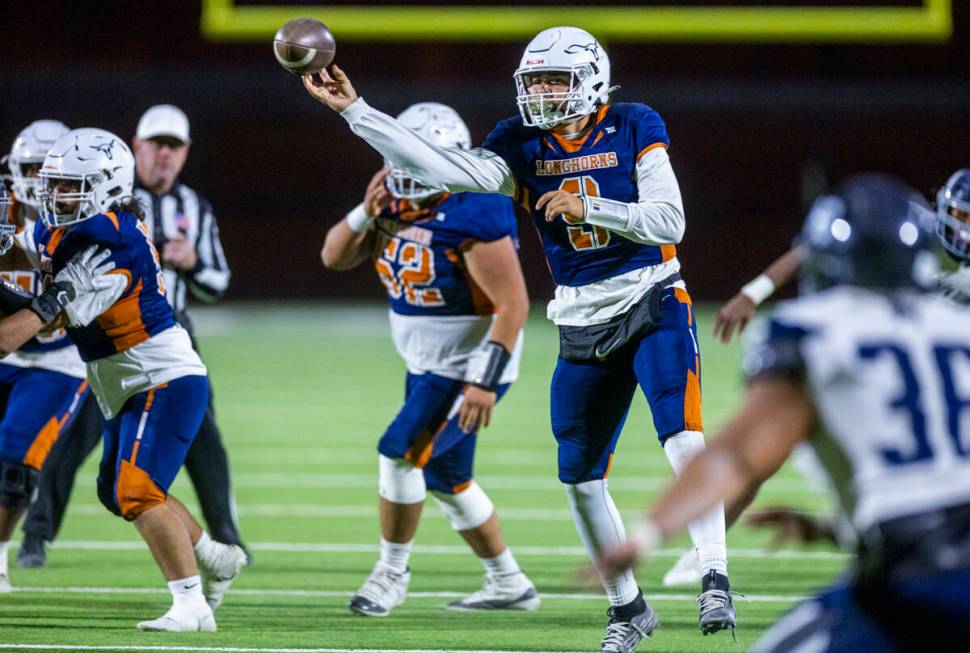 Legacy quarterback Aidan Crawford (9) slings a pass to a receiver against Shadow Ridge during t ...