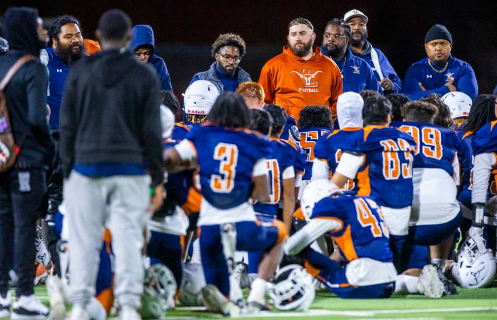 Legacy coaches console their players as they lose to Shadow Ridge following the second half of ...