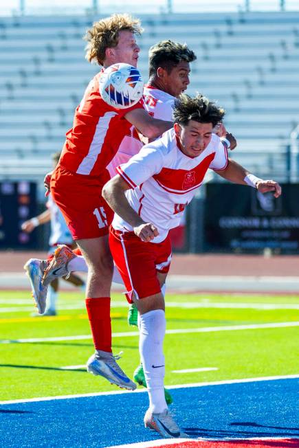 Wooster defender Christopher Noguera Aguirre (16) collides with Coronado defender Ben Aronow (1 ...