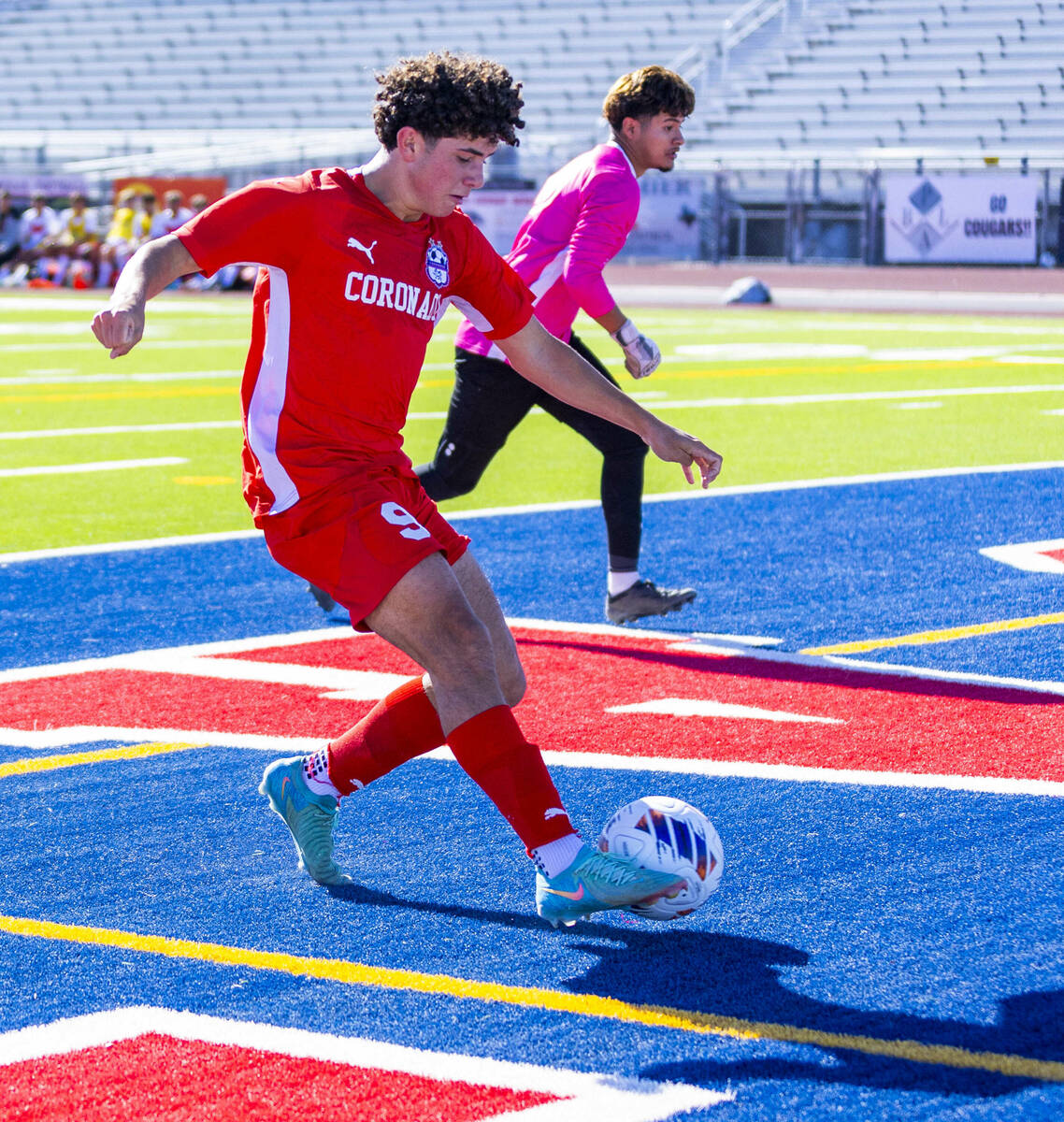 Coronado striker Dylan Flores (9) kicks another goal as Wooster goalkeeper Jason Acosta Plascen ...