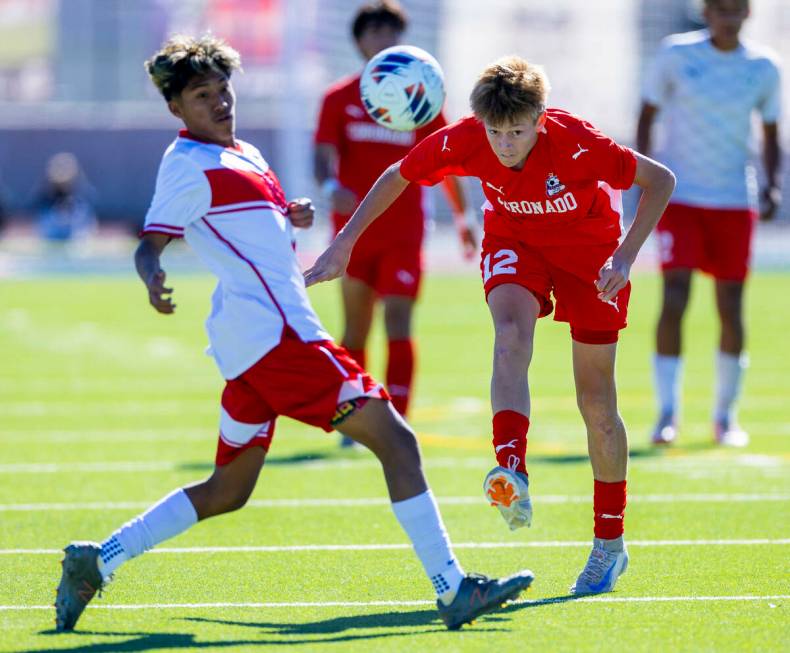 Coronado midfielder Liam Bringhurst (12) heads the ball as Wooster midfielder Brandon Carreto G ...