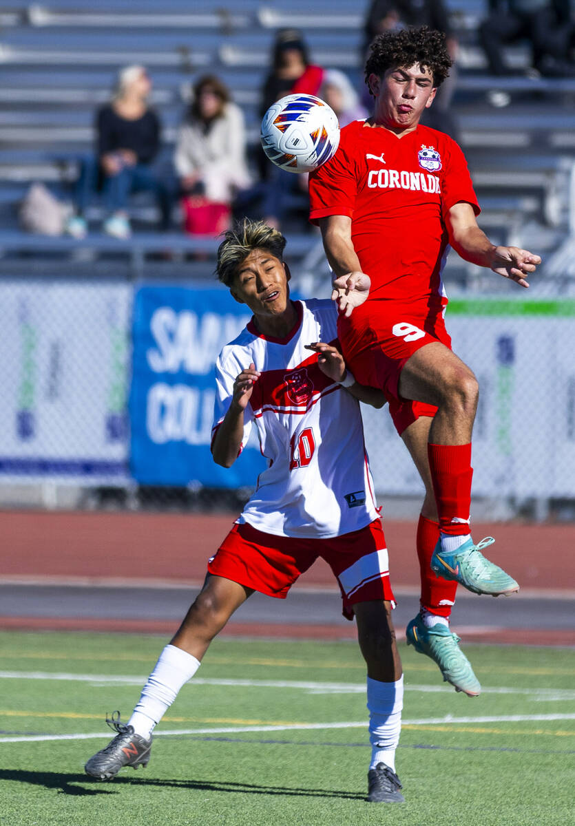 Coronado striker Dylan Flores (9) gets over Wooster midfielder Brandon Carreto Gomez (10) to se ...