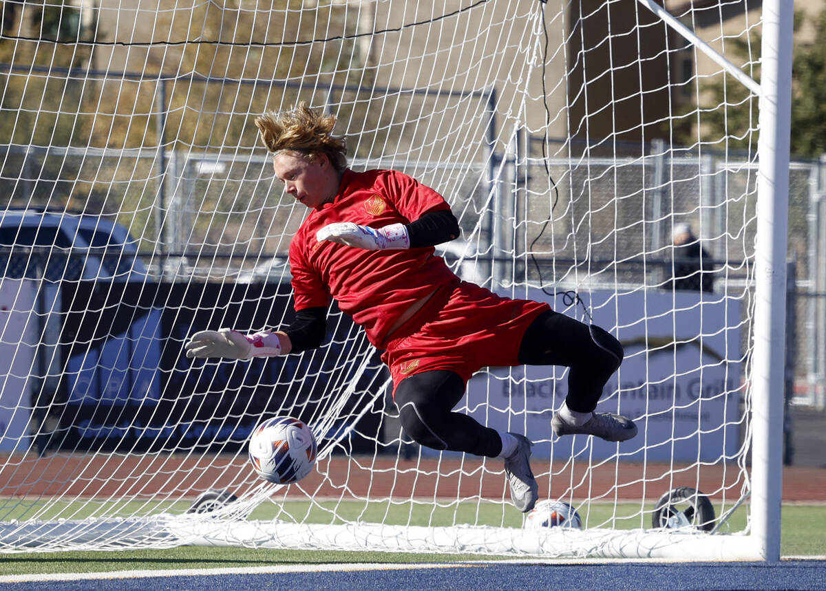 Palo Verde High's goalie Landon Blanchard blocks the ball during a Class 5A boys soccer State s ...