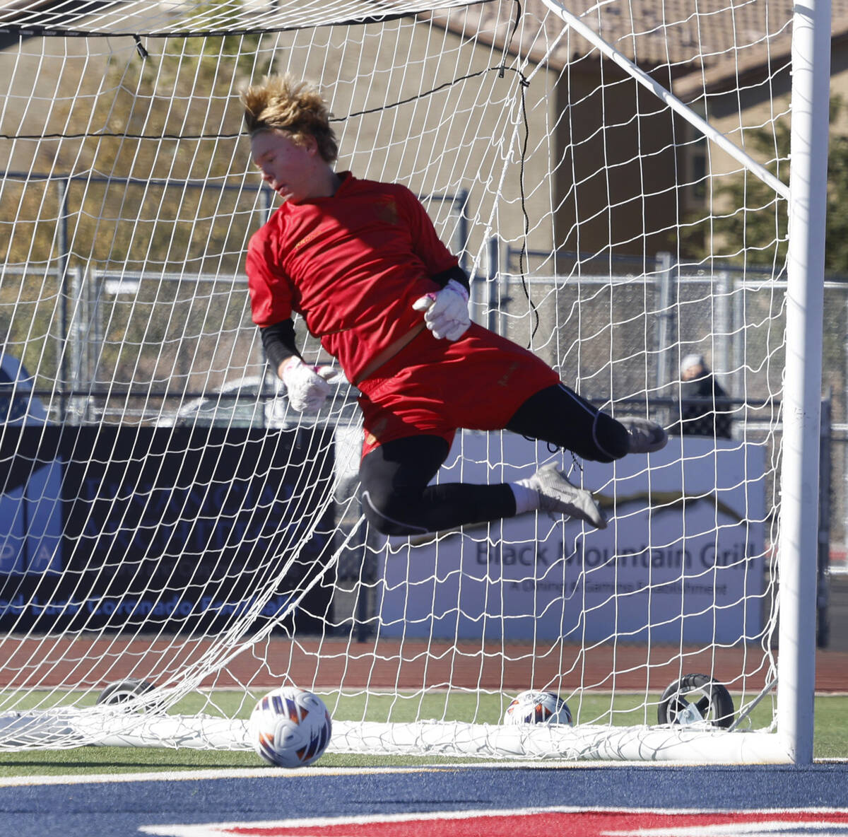 Palo Verde High's goalie Landon Blanchard leaps hafter blocking the ball during a Class 5A boy ...