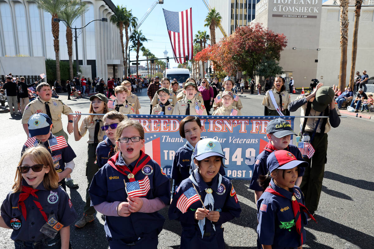 Cub Scouts and Boy Scouts march with the American Legion ‘Paradise’ Post 149 Las ...