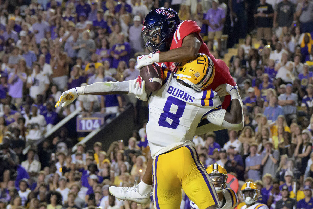 Mississippi wide receiver Tre Harris (9) makes a touchdown reception in the end zone against LS ...