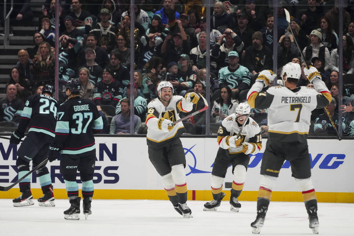 Vegas Golden Knights defenseman Alex Pietrangelo (7) reacts with teammates Pavel Dorofeyev, sec ...