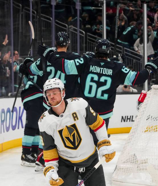 Vegas Golden Knights center Jack Eichel closes his eyes as the Seattle Kraken celebrate a goal ...