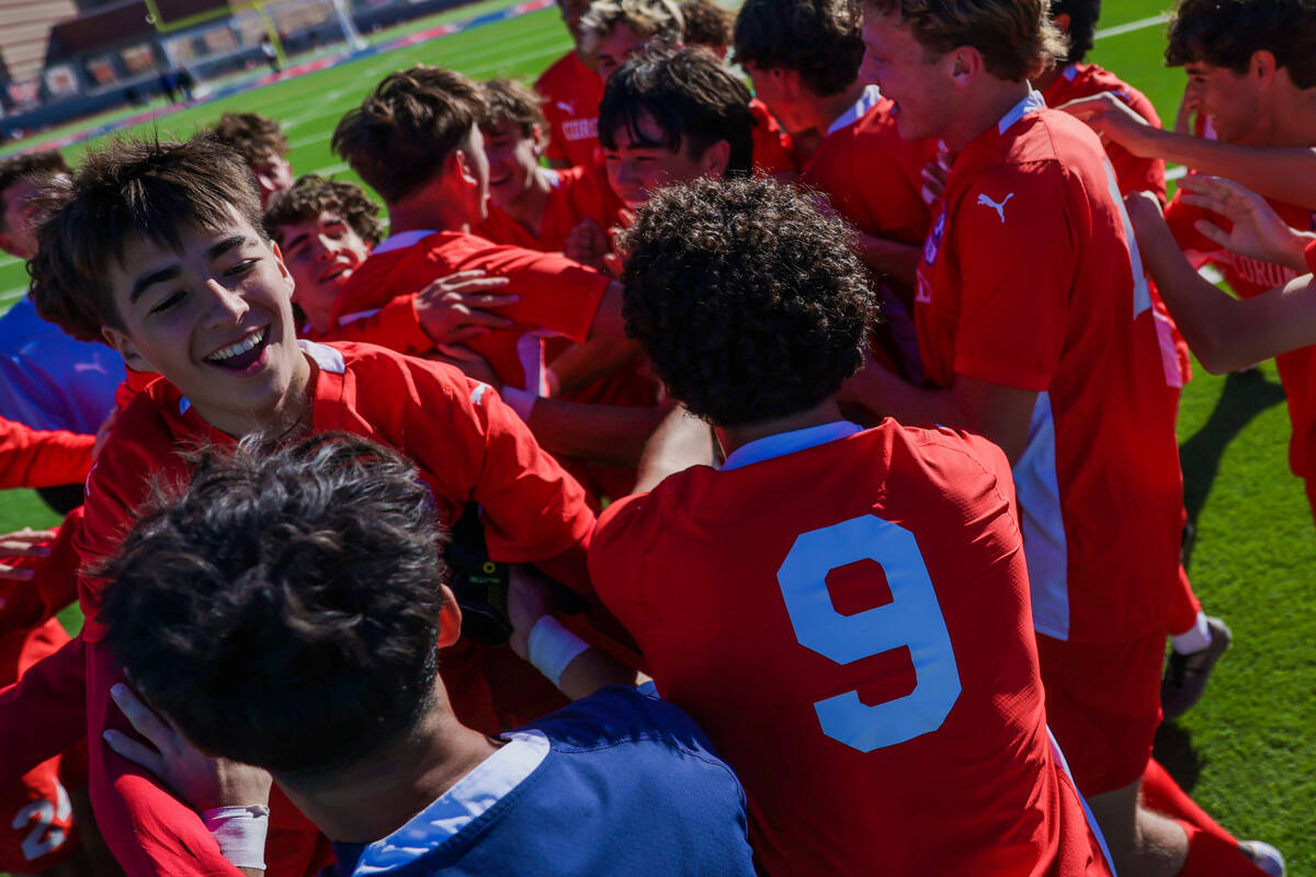 The Coronado boys soccer team celebrates during a 5A boys soccer state championship match betwe ...