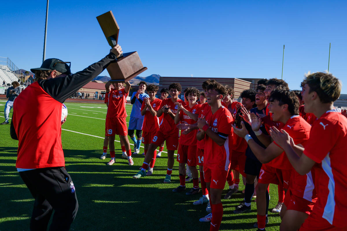 The Coronado boys soccer team celebrates during a 5A boys soccer state championship match betwe ...