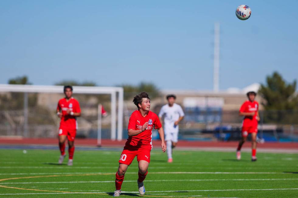 Coronado midfielder Aiden Sena (10) chases the ball during a 5A boys soccer state championship ...