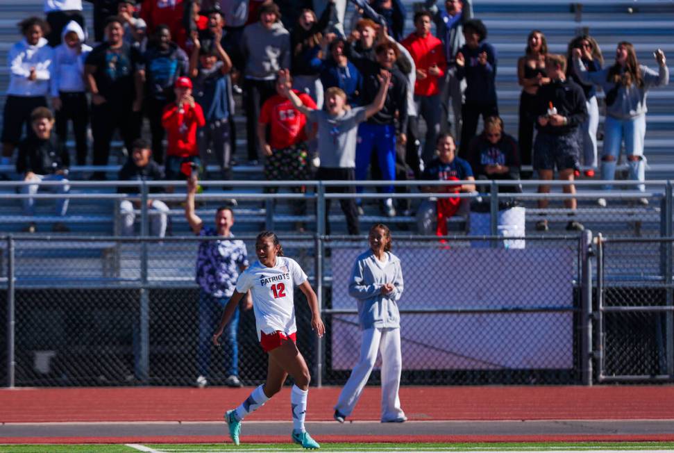 Liberty students cheer for Liberty midfielder Ayva Jordan (12) after a goal during a 5A girls ...