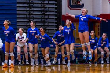 Bishop Gorman players erupt on the bench as the final point is won against Coronado in their Cl ...