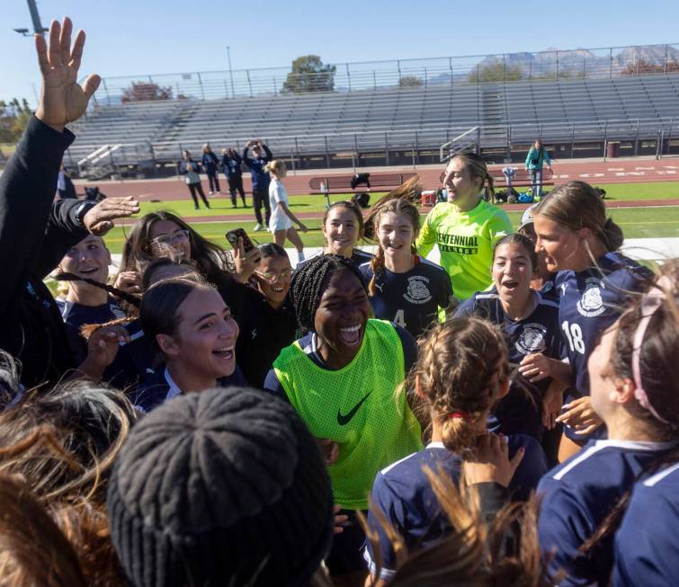 Centennial players celebrate winning the 4A girls soccer state title game 1-0 against Galena at ...