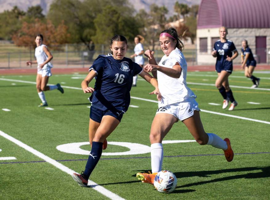 Centennial midfielder Julianne Donnelly (16) and Galena senior Emory Elgin (15) compete for the ...