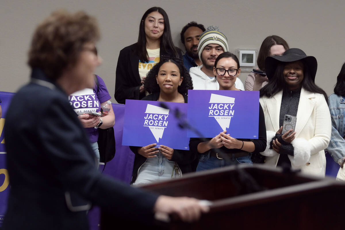 Supporters listen as Sen. Jacky Rosen, D-Nev., delivers remarks after winning re-election Satur ...