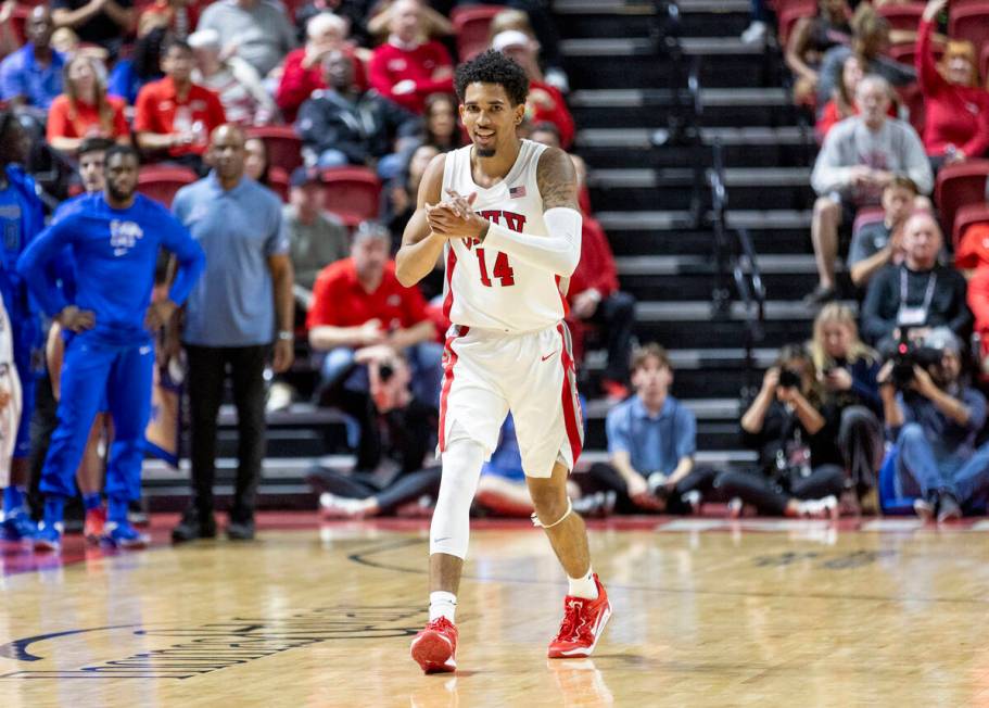 UNLV guard Jailen Bedford (14) celebrates after making a basket during the college basketball g ...