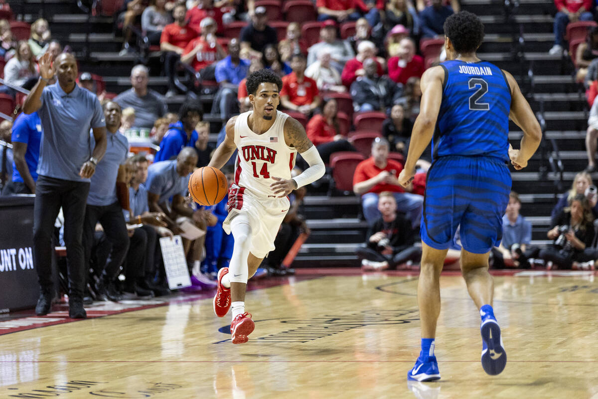 UNLV guard Jailen Bedford (14) competes during the college basketball game against the Memphis ...