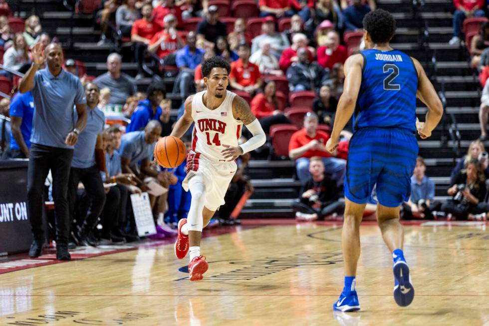 UNLV guard Jailen Bedford (14) competes during the college basketball game against the Memphis ...