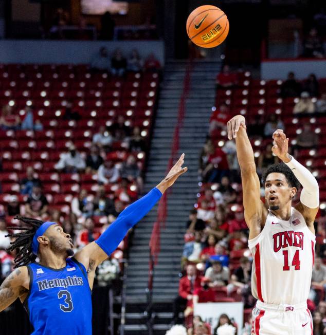 UNLV guard Jailen Bedford (14) shoots the ball during the college basketball game against the M ...