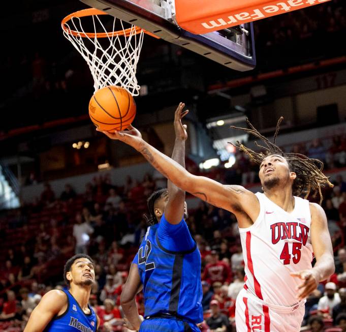 UNLV forward Jeremiah Cherry (45) attempts a layup during the college basketball game against t ...