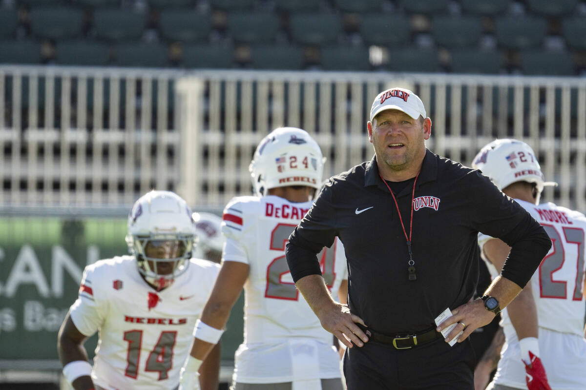 UNLV head coach Barry Odom is pictured before an NCAA college football game against Hawaii, Sat ...