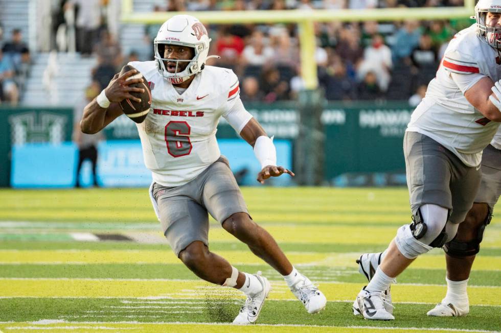 UNLV defensive back Jeremiah Vessel (6) runs the ball during the first half of an NCAA college ...