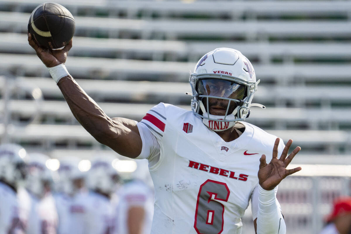 UNLV quarter back Hajj-Malik Williams (6) warms up for an NCAA college football game against Ha ...