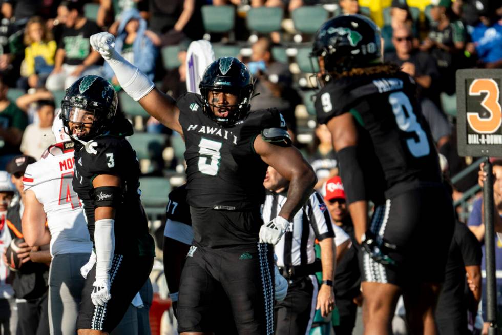 Hawaii defensive lineman Tariq Jones (5) celebrates after a play during the first half of an NC ...