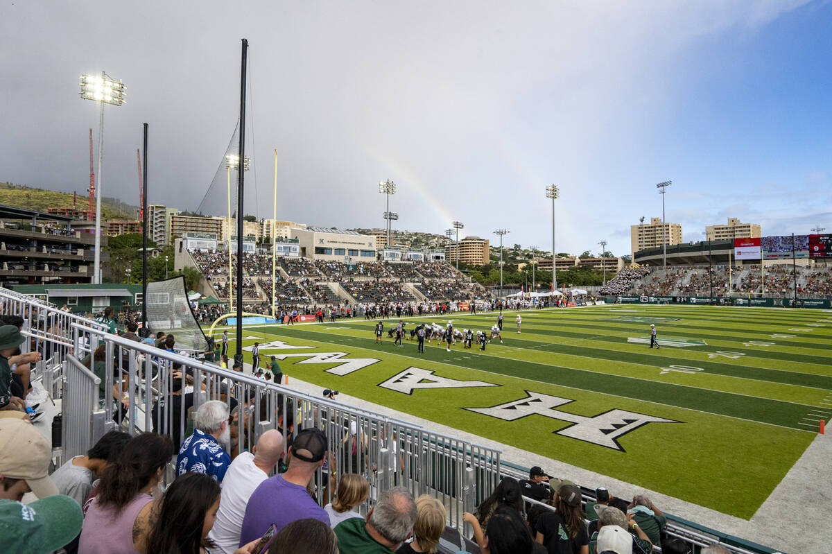 Rainbows are seen during an NCAA college football game between UNLV and Hawaii at the Clarence ...