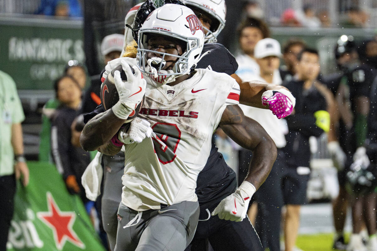 UNLV running back Jai'Den Thomas (9) runs the ball during the second half of an NCAA college fo ...