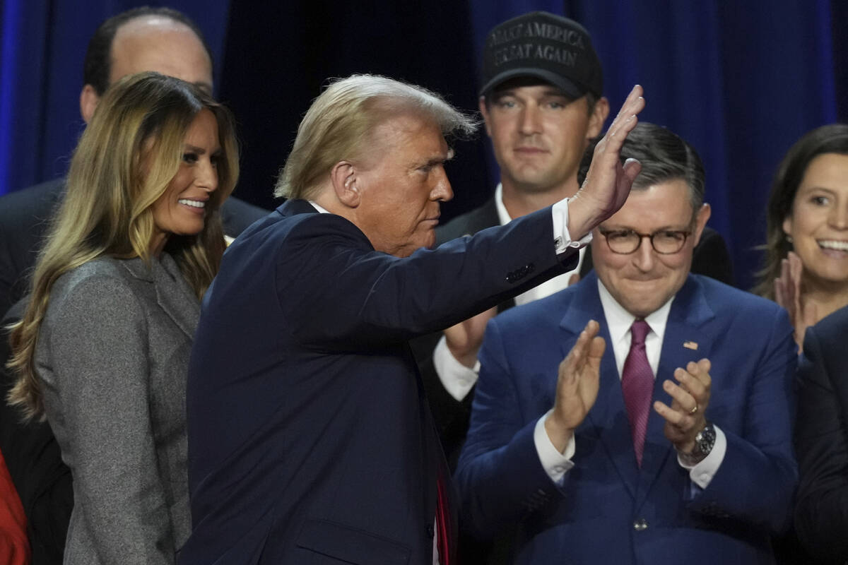 Donald Trump waves after speaking at the Palm Beach County Convention Center during an election ...