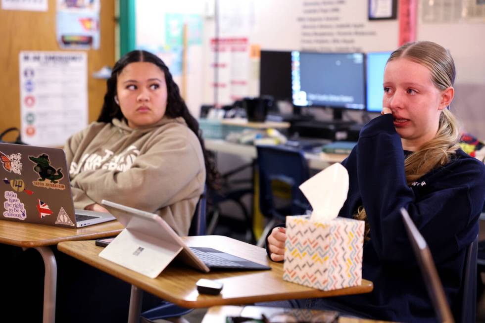 The InvestiGator Arts and Entertainment Editor Kennedy Milton, right, cries while talking about ...