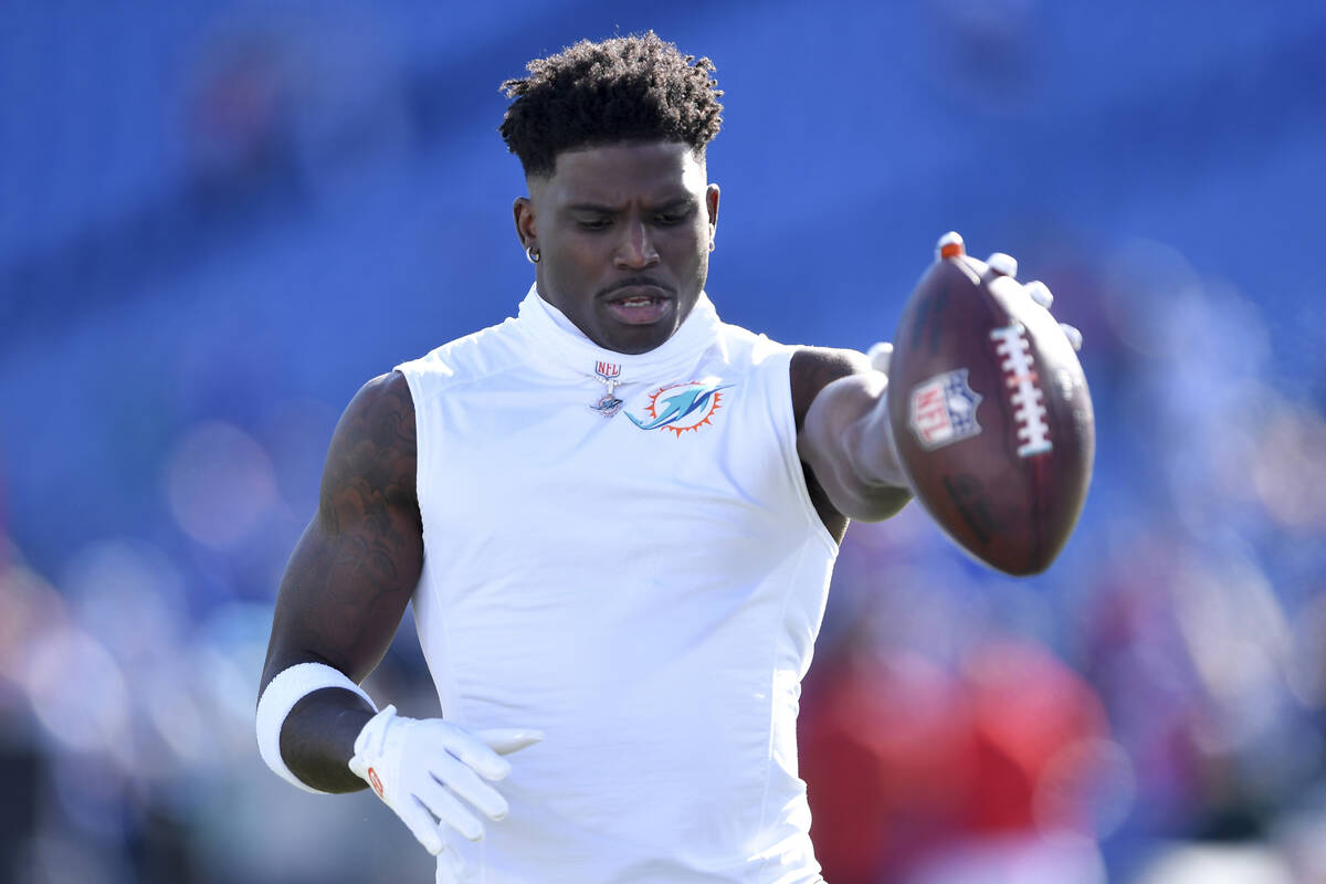 Miami Dolphins wide receiver Tyreek Hill warms up before an NFL football game against the Buffa ...