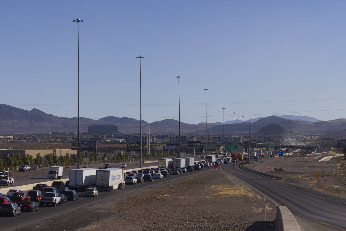 Traffic on Interstate 15 southbound is seen backed up as firefighters and the Nevada Highway Pa ...