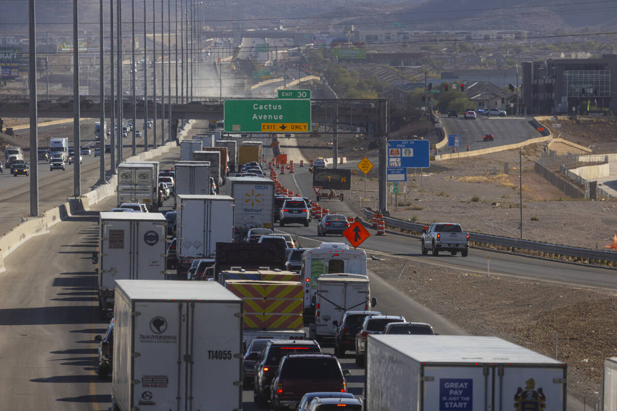 Traffic on Interstate 15 southbound is seen backed up as firefighters and the Nevada Highway Pa ...