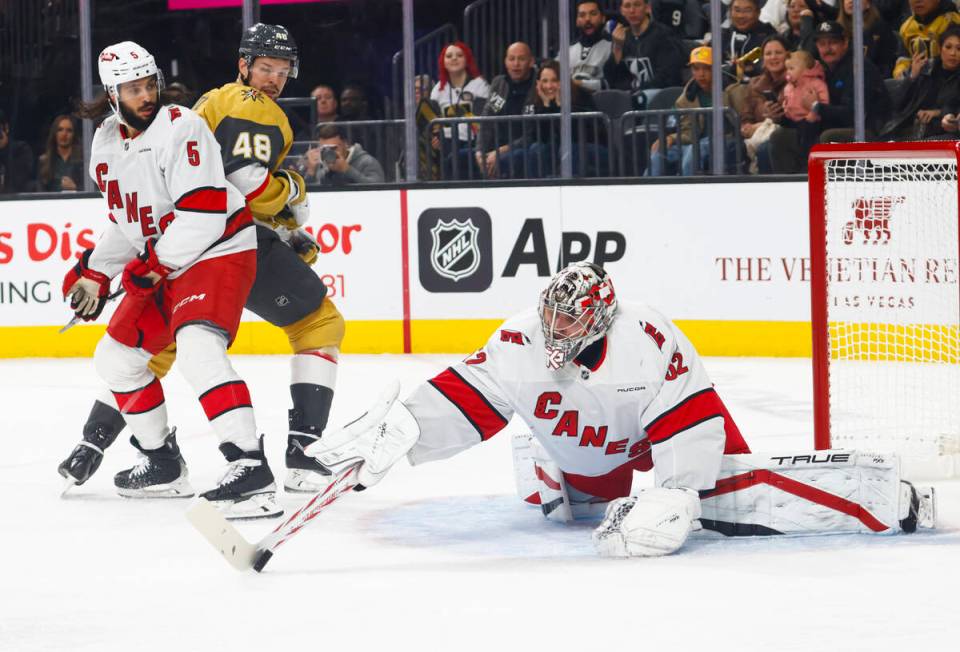 Carolina Hurricanes goaltender Pyotr Kochetkov (52) makes a save against the Golden Knights as ...