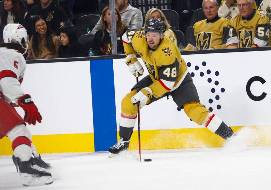 Golden Knights center Tomas Hertl (48) skates with the puck against Carolina Hurricanes defense ...