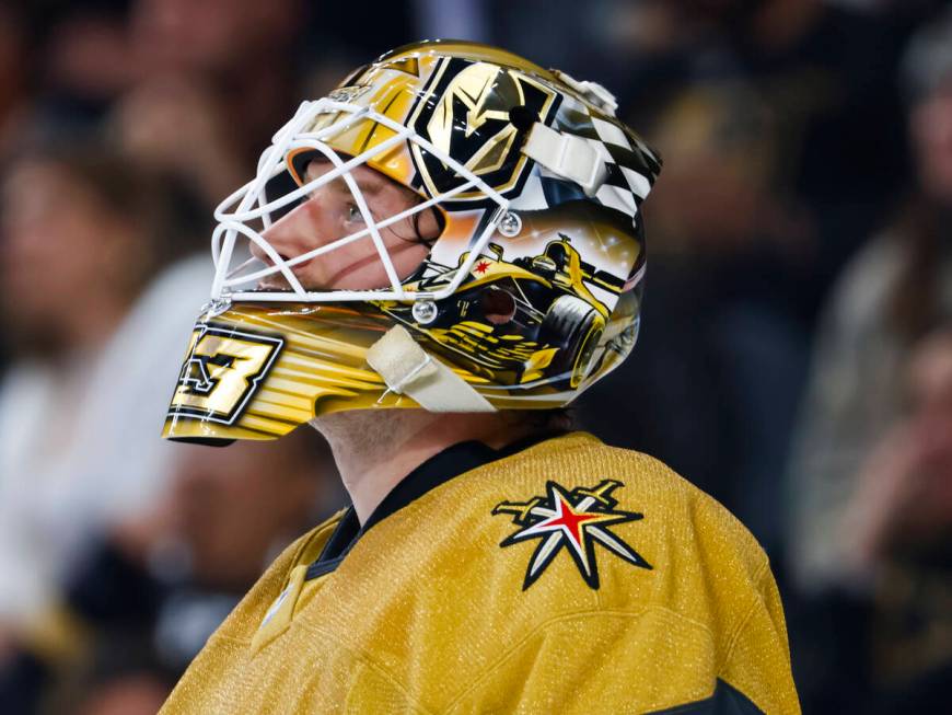 Golden Knights goaltender Adin Hill (33) looks on before being pulled from the game after givin ...