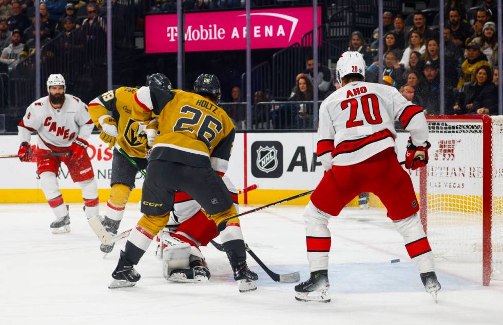 The Golden Knights score against the Carolina Hurricanes during the third period of an NHL hock ...