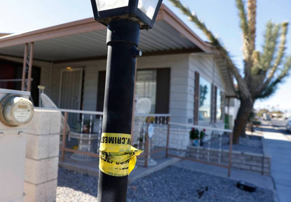 Crime scene tape is seen near the house where Monique Gilbertson's body was found, on Monday, N ...