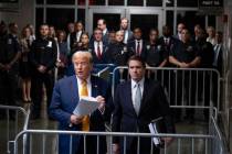 Former President Donald Trump, standing with defense attorney Todd Blanche, speaks at the concl ...