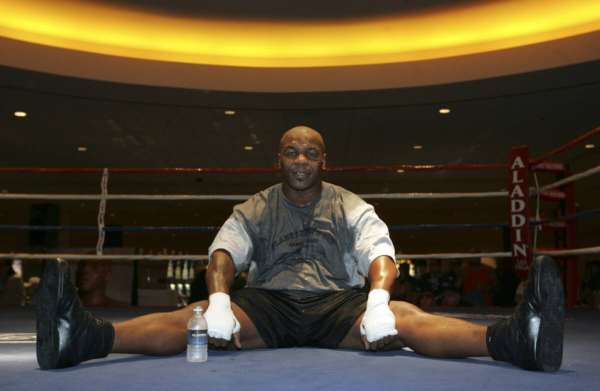 Mike Tyson holds a stretch during a workout session in 2006 at the Aladdin Resort Casino Las Ve ...